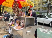 Furloughed IRS tax attorney starts second career running popular hot dog stand