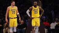 Lakers’ Luka Doncic joins LeBron James on sidelines to begin preseason games
