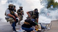 Tackles, projectiles and gunfire: Many fear ICE tactics are growing more violent