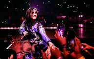 Billie Eilish violently pulled into crowd at Miami concert