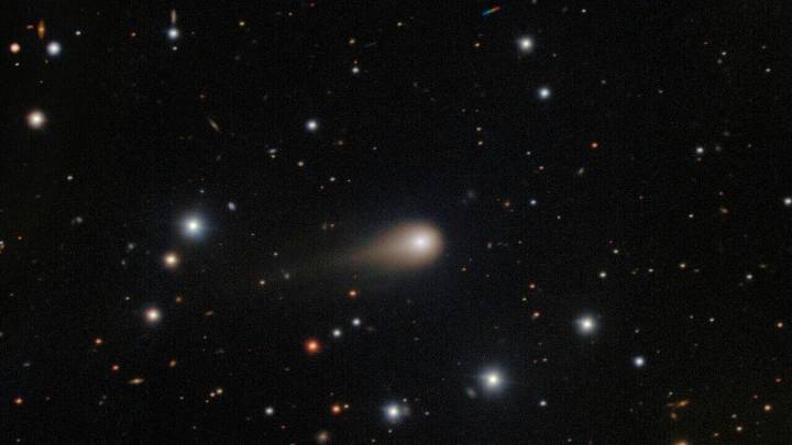 Interstellar comet swinging past Mars as a fleet of spacecraft looks on