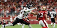 Christian McCaffrey’s 200-yard game from scrimmage powers 49ers past Falcons 20