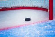 Police and firefighters face off in Lancaster charity hockey game