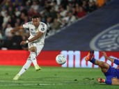Mbappe sends Real Madrid top as Getafe self
