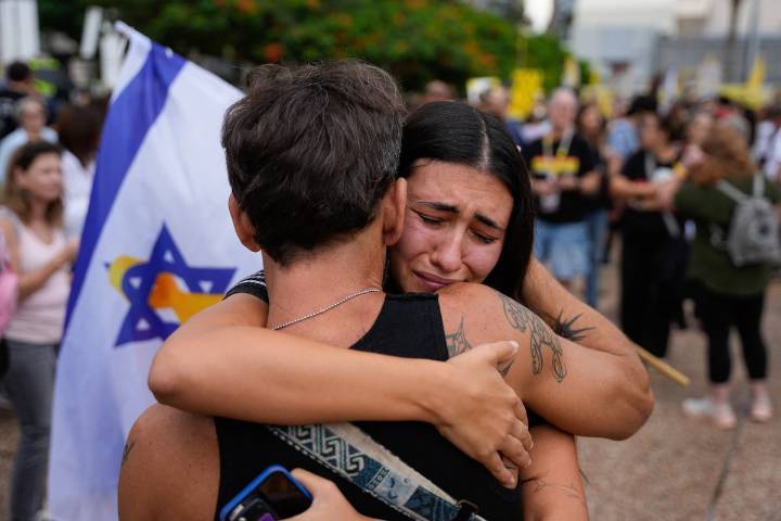 Cautious hope in Israel and Gaza as two sides agree to first phase of ceasefire plan