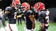 Falcons ride Robinson's 170 rushing yards, including 81