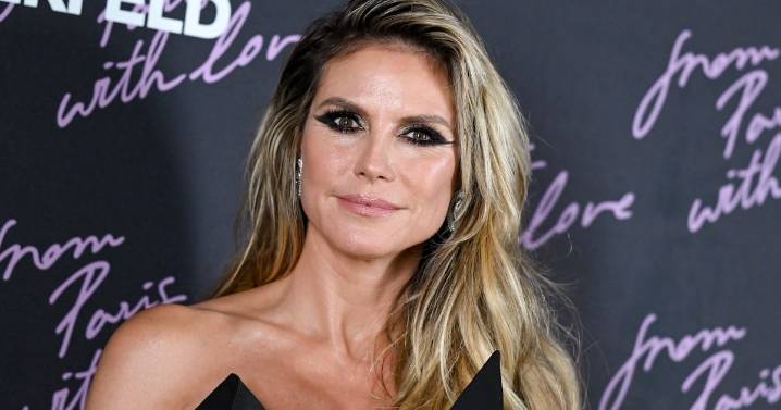 Heidi Klum Flaunted Her Bra Under A See-Through Catsuit At PFW