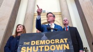 The blame game is on at federal agencies, where political messages fault Democrats for the shutdown