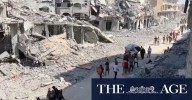 Thousands of Palestinians return to what remains of their homes as Gaza ceasefire begins