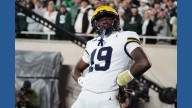 Justice Haynes runs for 152 yards and 2 TDs as No. 25 Michigan beats Michigan State 31
