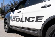 Man found hanging from Houston highway with burns from a possible fire, police say