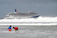 Hurricanes Humberto and Imelda charge toward Bermuda as the tiny island prepares