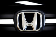 Exclusive-Japan warns Vietnam of job losses as Hanoi motorbike ban hits Honda