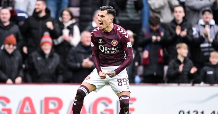 Alexandros Kyziridis sees Celtic win cap 'the best week of my life' as Hearts star celebrates birth of son in style