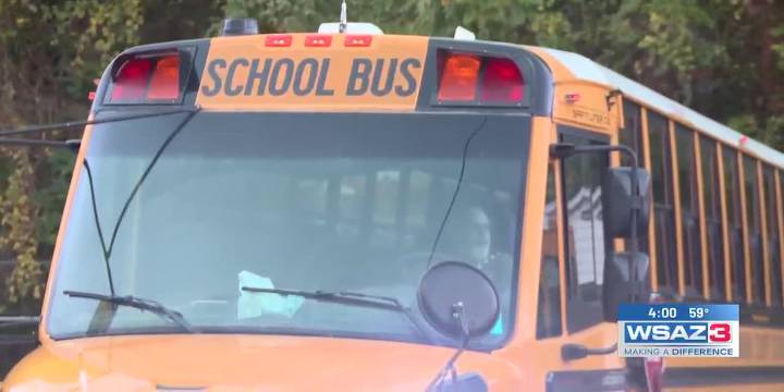 Safety officials warn drivers about the dangers of passing school buses