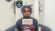 Man arrested after fatal shooting at barbershop off Greenwell Springs Road
