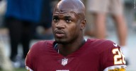 Former NFL star Adrian Peterson arrested in Houston suburb on DWI and gun charges