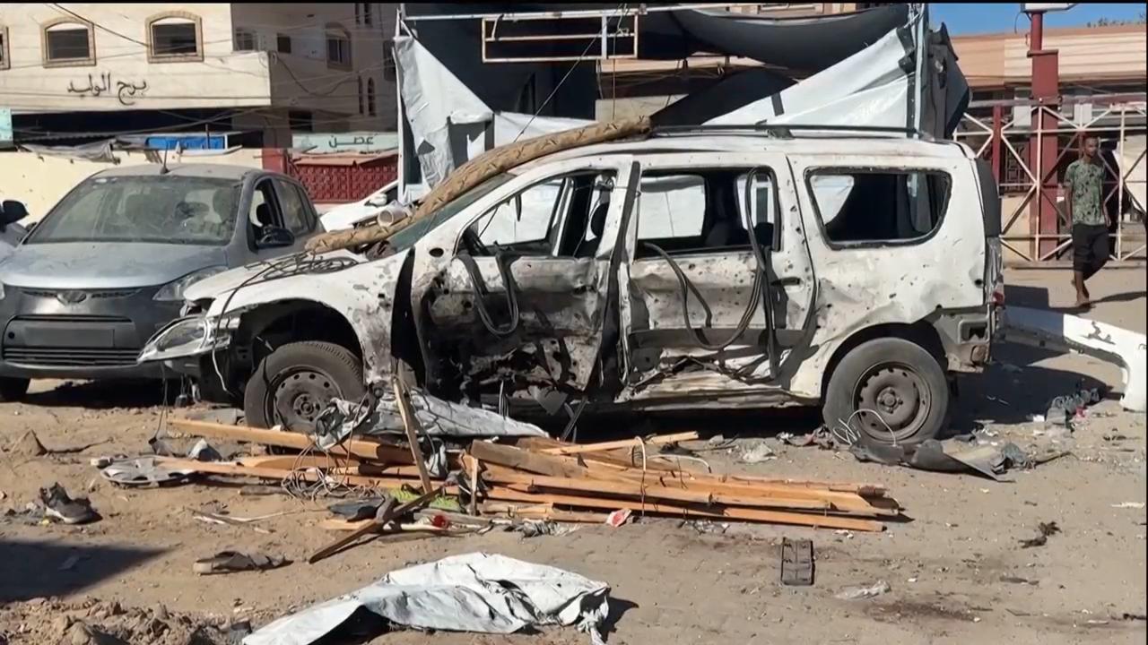 Aftermath of Israeli strike that hit a tent in the courtyard of a hospital in Deir al