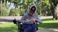 Man known for his positive spirit reclaims the corner where his life nearly ended