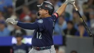 Why Mariners were called for interference out after Blue Jays throw off Josh Naylor's head
