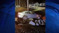 Londonderry NH crash into rock wall