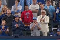 Here’s why Colonel Sanders was behind home plate at Toronto Blue Jays World Series game