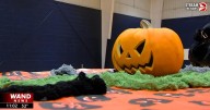 UIS students trade candy for cans in Halloween tradition