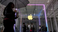 Apple hits $4 trillion market value as new iPhone models spark sales