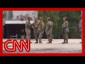 Troops arrive in Illinois for training amid Trump push to deploy guard