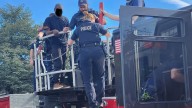 Burglary suspect climbs onto roof to escape capture