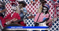 Patriotic skeletons take over Wisconsin lawn for early July 4th celebration