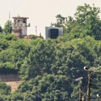North Korean soldier held by Seoul after crossing land border
