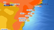 Almost a dozen uncontrolled bushfires rage throughout NSW as millions sizzle in record