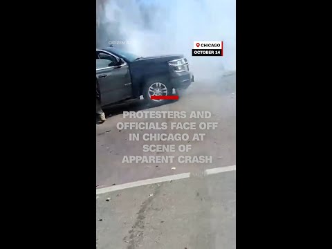 Protesters and officials face off in Chicago at scene of apparent crash