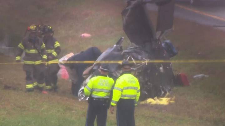 Plane crashes onto a Massachusetts highway, killing 2 on board and hurting 1 motorist