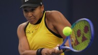 Naomi Osaka is out of the Japan Open quarterfinals with a left leg injury