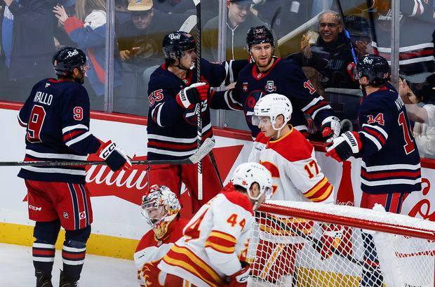 The Winnipeg Jets beat the Calgary Flames in NHL action