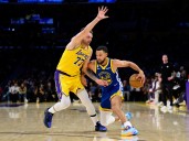 La NBA comenzó con dos partidazos: Doncic no pudo impedir la caída de los Lakers ante los Warriors de Curry y ganó el campeón, Oklahoma City