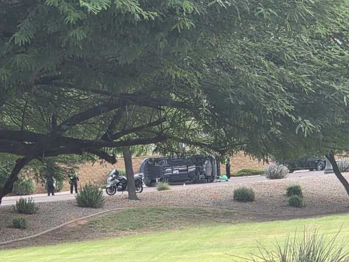 Driver walks away from a wreck that put a car on its side