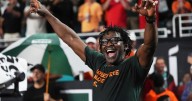 Why is Michael Irvin the most famous cheerleader in college football? Miami can't get enough of him