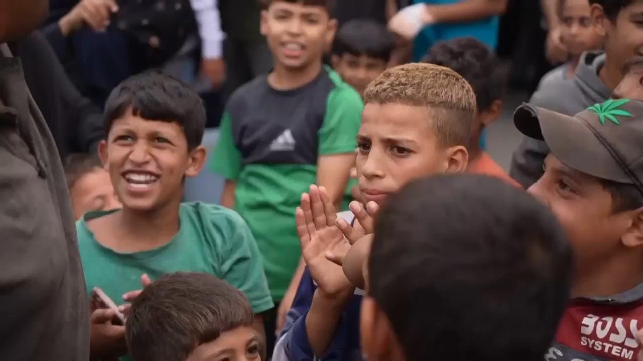 Celebrations in central Gaza Strip after Israel and Hamas agree to the 'first phase' of peace plan
