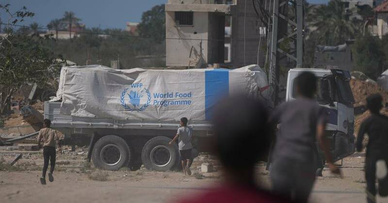 Aid trucks roll into Gaza Strip, Rafah opening expected