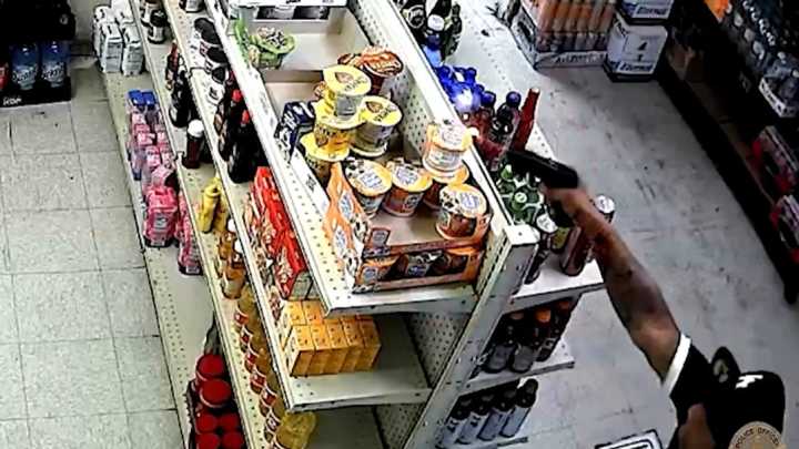 Video captures man opening fire at LAPD cops inside liquor store