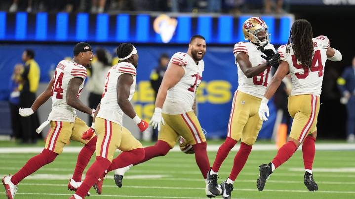Short-handed 49ers stop Rams on downs in overtime, preserving a 26