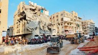 Renewed fighting tests Gaza ceasefire and Israel briefly halts aid