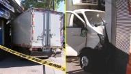 Camión colisiona con vehículo, pierde el control y termina incrustado en almacén de Ñuñoa