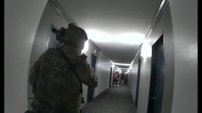 ‘I’m not dressed:’ SWAT officers evacuate hotel guests before killing fugitive