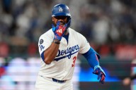 Ohtani and Hernández power Dodgers past Reds 10-5 with 2 homers each in Wild Card Series opener