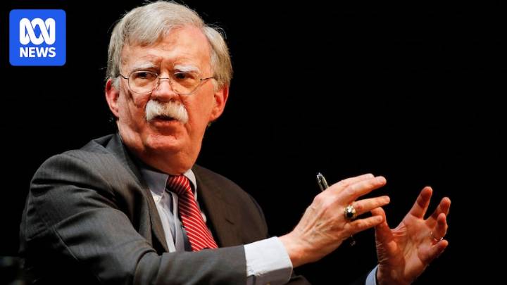 What has John Bolton, former Trump adviser, been charged with and what happens now?