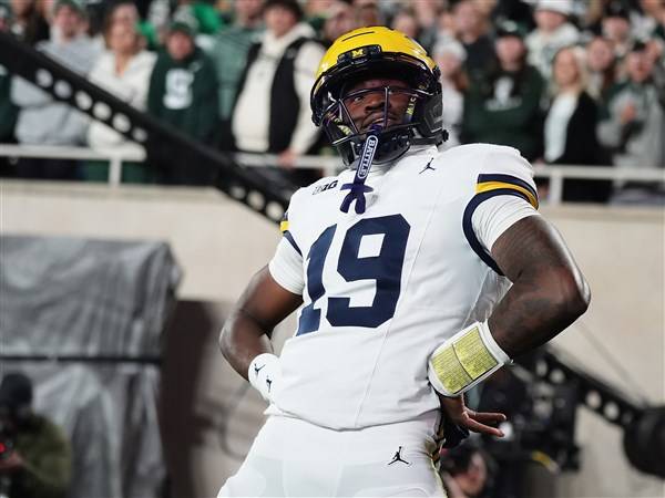 Justice Haynes runs for 152 yards and 2 TDs as No. 25 Michigan beats Michigan State 31